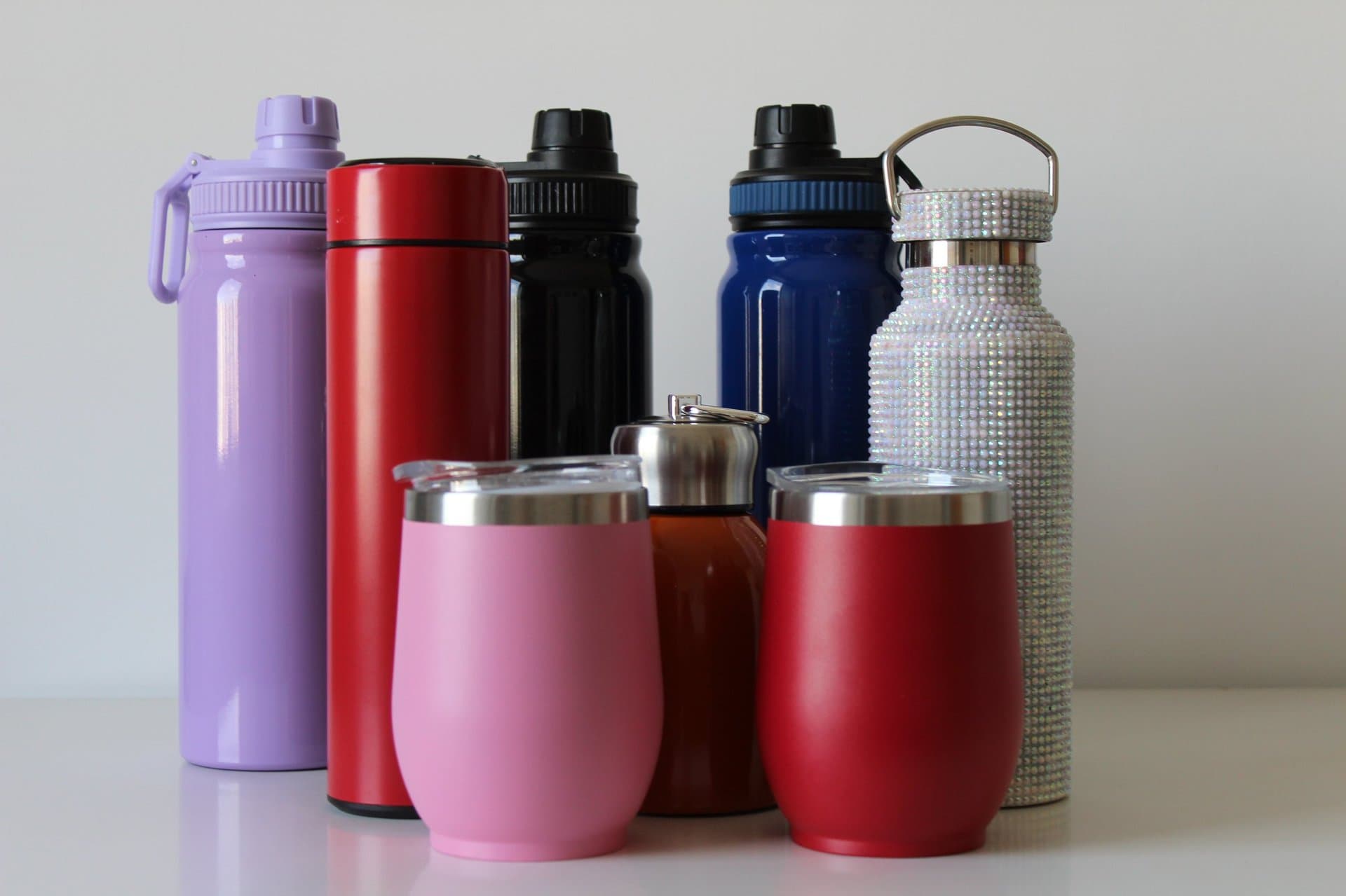 Assortment of customizable tumblers and drinkware ready for branding